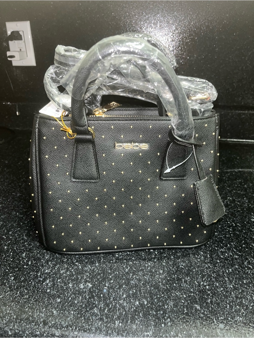 bebe Black Satchel with Gold Stud Detailing